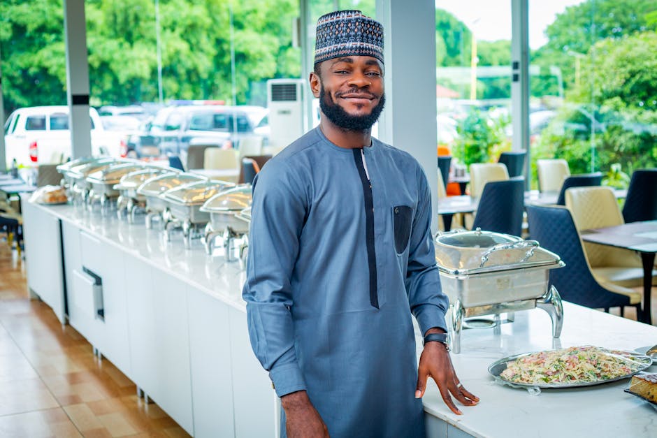 African chef in restaurant